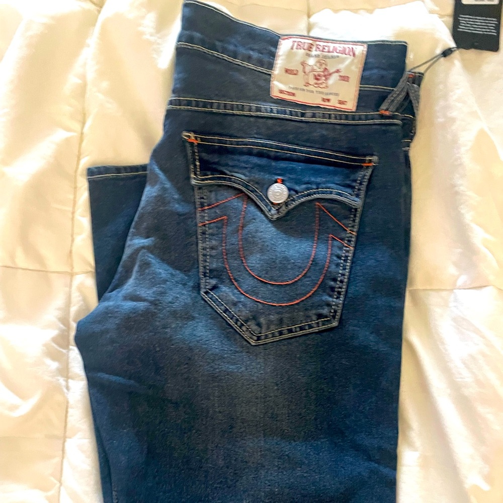 Brand newTRUE RELIGION
men’s jeans COLOR: WASH GENO SN FLAP SLIM
SIZE:
34w 32 L